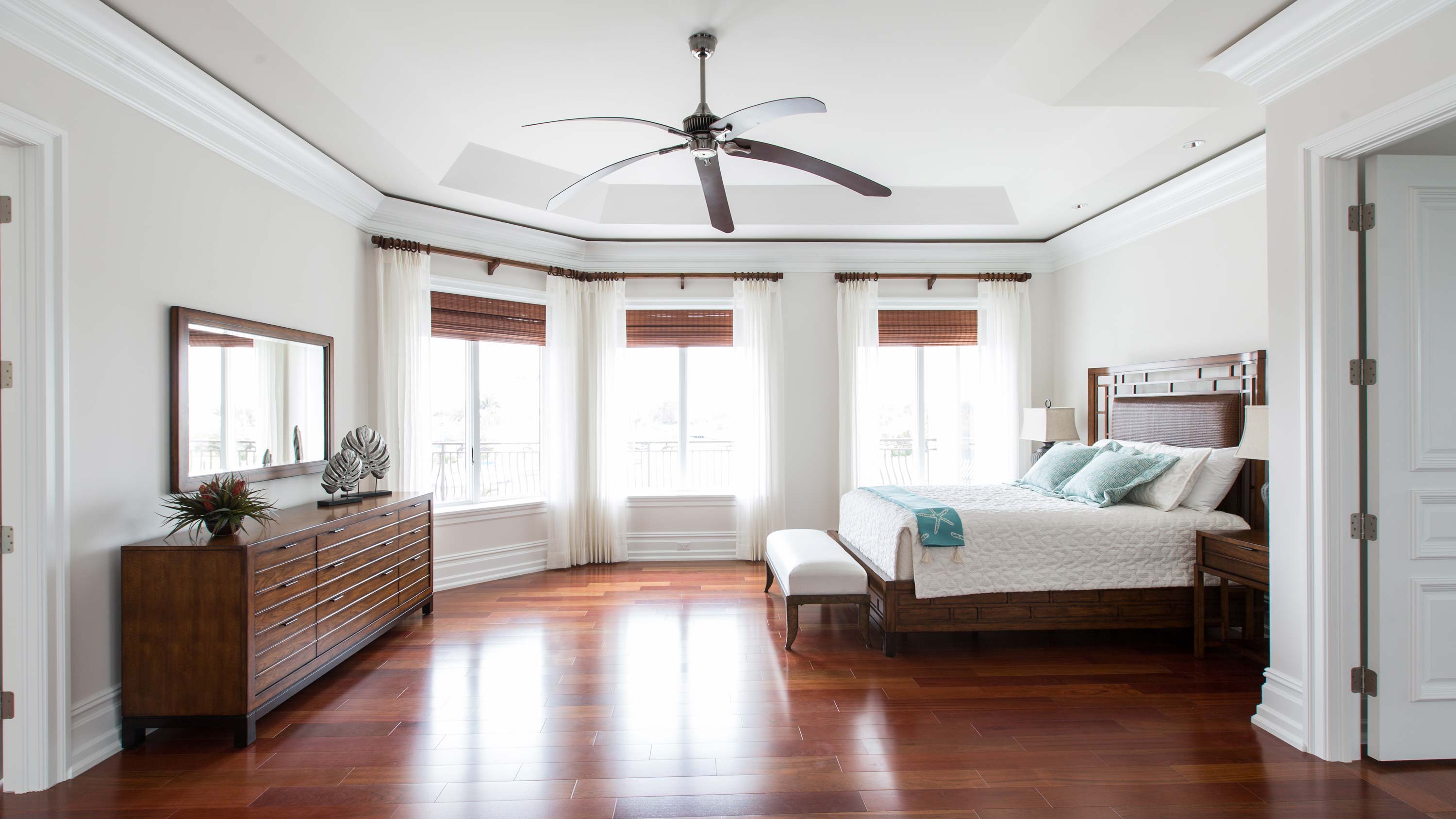 wooden floors and furniture in bedroom